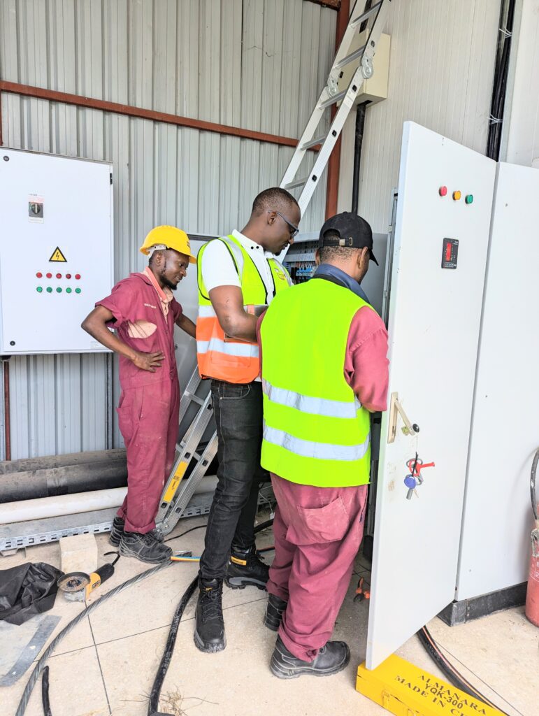 Precision in action! Supervising the MCCB installation, our skilled engineer ensures every detail meets the highest safety standards at Interchick.